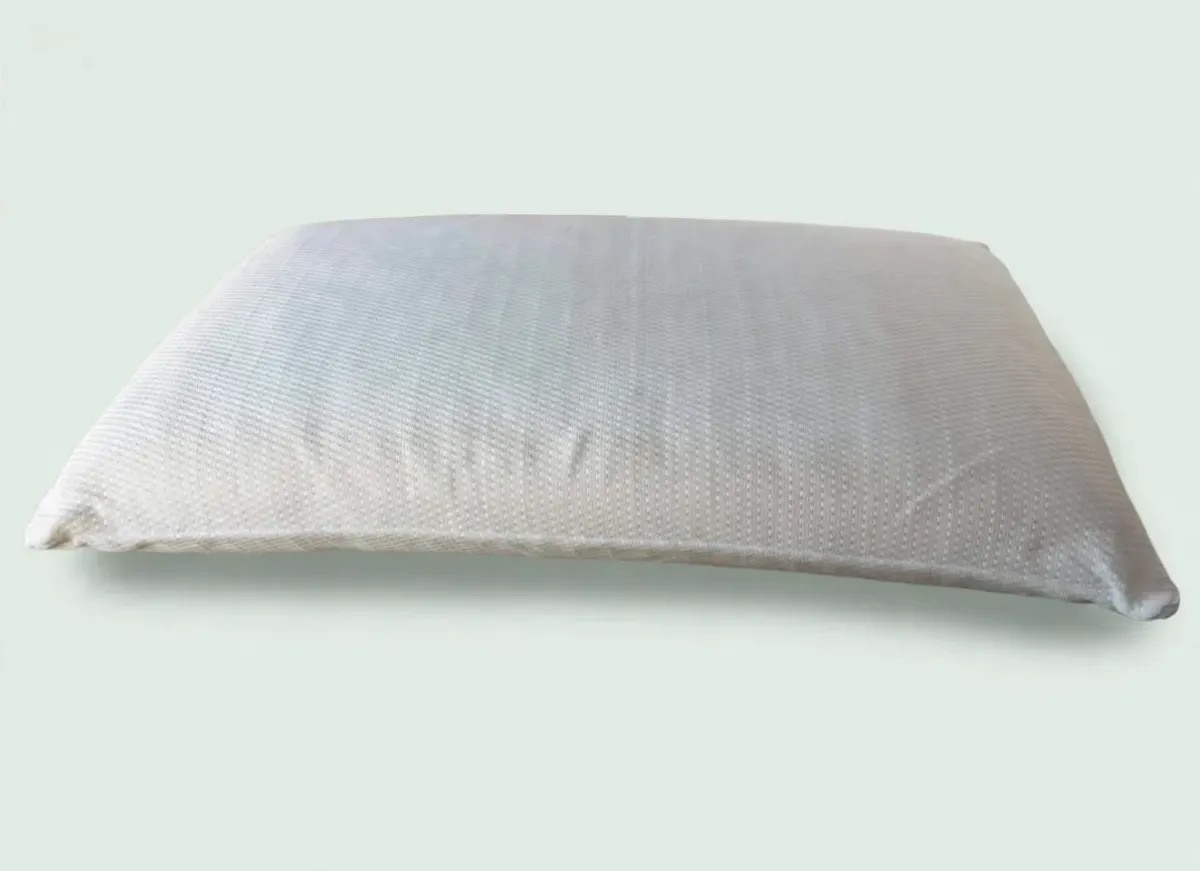 Guanciale in memory foam con fodera bianca lavorata, visto di lato